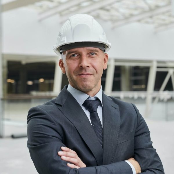 confident-businessman-at-construction-site-1-1.jpg